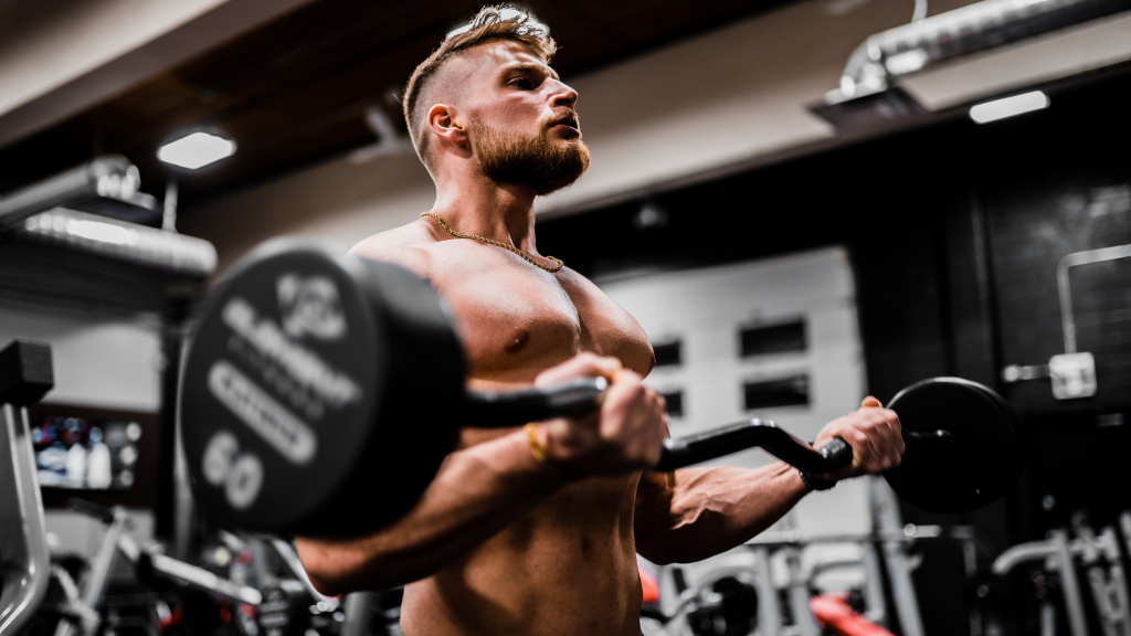 A man building muscle using a paleo workout supplement